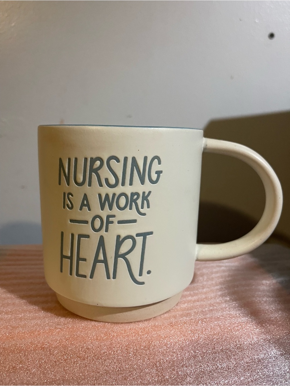 Nursing Is A Work Of Heart Ceramic Coffee Mug - Cream